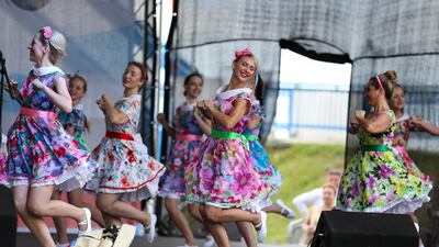 Villagers of Bronnitsy perform at the Lionel Messi birthday party. Getty