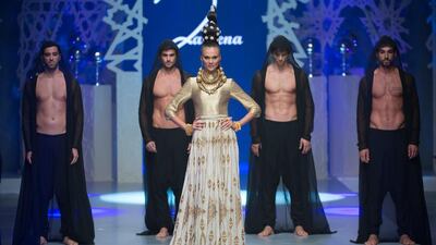 A model walks the runway at the Zareena show during Fashion Forward at Madinat Jumeirah on October 5, 2014 in Dubai. Ian Gavan / Getty Images for Fashion Forward