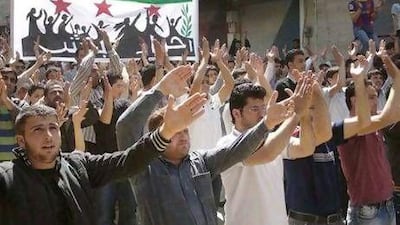 Syrians demonstrate in Idlib, north Syria.