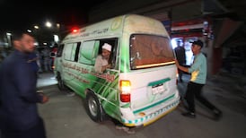 A vehicle carrying the bodies of victims leaves a hospital in Ismailia after the road accident in Egypt. Reuters