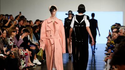 At Maison Margiela, John Galliano stretches a trench coat into a dress. Yes it's worn on a man, but this is why we love Galliano. He is unafraid to court controversy. Getty 