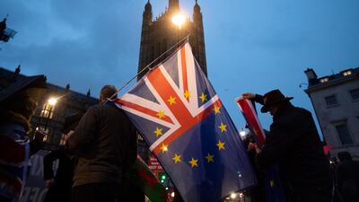 Pro-EU flags fly outside the Houses of Parliament. EPA