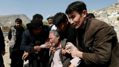 An Afghan Shiite Muslim man mourns during the funeral of his daughter who was killed in the attack at the Sakhi Shrine in Kabul, Afghanistan on October 12, 2016. Mohammad Ismail/Reuters