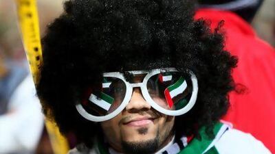 An Emirati fan cheers prior to the start of the 21st Gulf Cup final football match between United Arab Emirates and Iraq in Manama, on January 18, 2013.