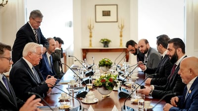 German President Frank-Walter Steinmeier and Mr Al Shara meet at Bellevue Palace. Reuters