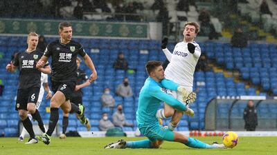 Leeds United attacker Patrick Bamford is brought down by Burnley goalkeeper Nick Pope before picking himself up to score the game's only goal from the penalty spot at Elland Road. Getty