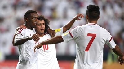 Omar Abdulrahman, centre, is the UAE's chief creative fulcrum and his service to Ahmed Khalil, left, and Ali Mabkhout, right, will be missed at the Asian Cup. Getty Images