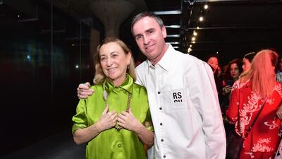 Designers Miuccia Prada and Raf Simons at the Prada resort show on May 4, 2018. AFP / Getty Images North America