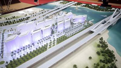 The company’s flagship project, The Gateway located between the Maqta Bridge and the Sheikh Zayed Bridge in Abu Dhabi appears to remain stalled. Above, a model of Eshraq's The Gateway development. Sammy Dallal / The National