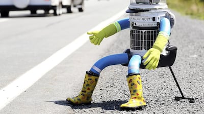 HitchBot is trying to be the first robot to hitchhike 6,000km across Canada. Photo: Reuters / Paul Darrow