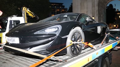 A McLaren is removed from Wellington Arch. Photo: Metropolitan Police