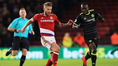 Adam Clayton of Middlesbrough is closed down by Victor Moses of Chelsea. Jan Kruger / Getty Images