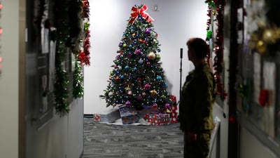A decorated tree stands in the Norad Tracks Santa Centre at Peterson Air Force Base, Monday, Dec. 23, 2019. AP