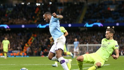 Manchester City forward Raheem Sterling of is tackled by Dinamo Zagreb's Petar Stojanovic. Getty Images