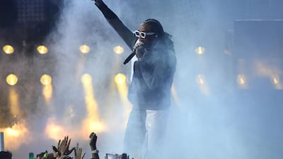 Band Migos performed. AFP