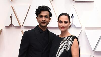 Utkarsh Ambudkar and Naomi Campbell arrive at the Oscars on Sunday, February 9, 2020, at the Dolby Theatre in Los Angeles. AP