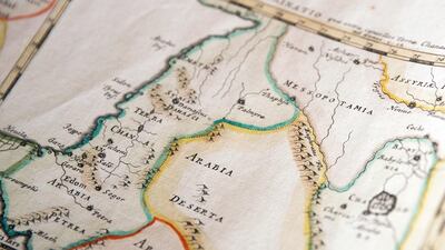 Hazem Harb collects original archival material from Palestine’s past, such as maps of the area dating back to the 1600s. Reem Mohammed / The National