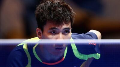 Jung Youngsik of Korea in action against Chiang Hung-Chieh of Chinese Taipai during day one of the Nakheel Table Tennis Asian Cup 2016 at Dubai World Trade Centre on April 28, 2016 in Dubai, United Arab Emirates. (Photo by Warren Little/Getty Images)