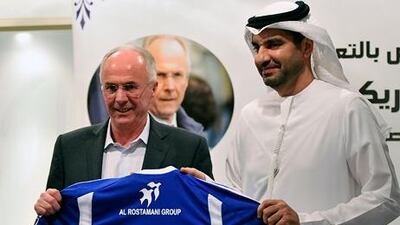 Sven-Goran Eriksson is presented with an Al Nasr shirt by Ahmed Hashin Khoory during his introduction as the Pro League side's new technical director.