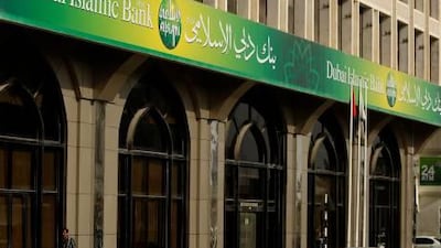 Pedestrian traffic in front of Dubai Islamic Bank on Airport Road in Abu Dhabi.