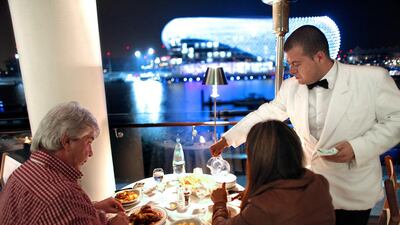 Patrons enjoy the serve of Cipriani Yas Island, an Italian restaurant on Yas Island. Sammy Dallal / The National