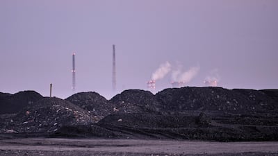Vapour rises from cooling towers at the Rybnik Power Plant in Poland. Bloomberg