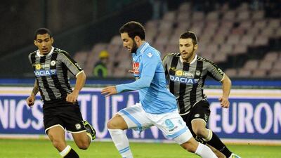 Gonzalo Higuain and Napoli need top Arsenal and see Marseille draw or beat Borussia Dortmund to have a chance of advancing. Salvatore Laporta / AP