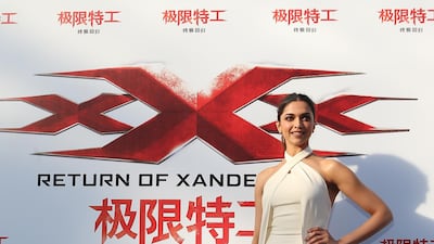 Deepika Padukone, in a minimalist white gown, attends a red carpet for 'xXx: Return of Xander Cage' in Beijing on February 9, 2017. Getty Images
