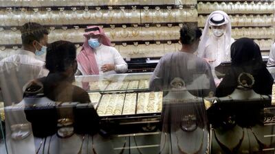 Saudis buy jewels at the gold market a day before the expected increase of VAT from 5% to 15%, in Jiddah, Saudi Arabia. AP Photo