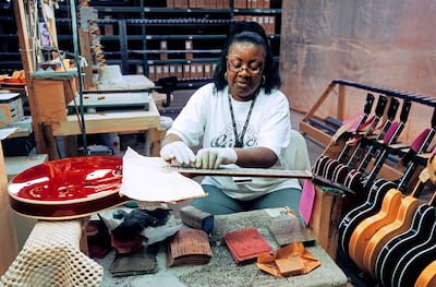 The craftsmanship that goes into each Gibson guitar is what makes them so prized by collectors. Alamy
