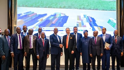 Yuvraj Narayan, chief executive of DP World, and Dapo Abiodun, Governor of Ogun State, surrounded by officials during the signing ceremony in Nigeria. Photo: DP World