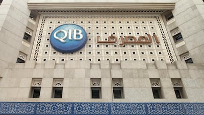 A logo sits on display outside a Qatar Islamic Bank branch in Doha, Qatar. Gabriela Maj/Bloomberg via Getty Images