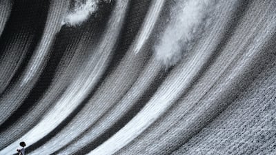 A child enjoying the water feature at the Expo 2020 site in Dubai. Pawan Singh/The National.