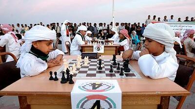 Sultan Abdul Aziz, left, and Khalid Rashid Ahmed play chess in Fujairah as part of the 38th National Day celebrations. Pawan Singh / The National