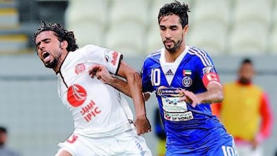 Habib Farhan, right, and his Al Nasr teammates did not give much room away. Abdullateef Al Marzouqi / The National.