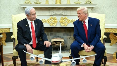 US President Donald Trump, right, is helping to shield Israeli leader Benjamin Netanyahu, left, from an international arrest warrant over alleged war crimes in Gaza, a former ICC prosecutor says. AFP