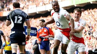 Ugo Monye, centre, celebrates his opening try in England’s 26-12 win at home to Scotland in 2009.