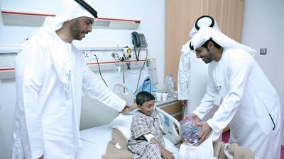 A delegation from the Abu Dhabi City Municipality visited Rahba Hospital to meet bed-ridden children and cheer them up by offering them gifts. Courtesy Abu Dhabi City Municipality