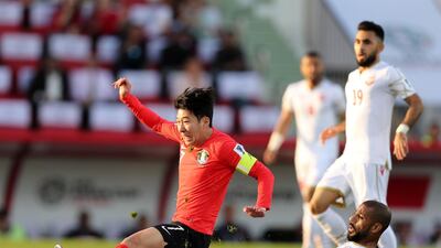 Son Heung-min of South Korea and Abdulwahab Ali Alsafi of Bahrain battle during the game between South Korea and Bahrain in the Asian Cup 2019. Tuesday, January 22nd, 2019 at Rashid Stadium, Dubai.
