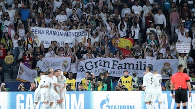 Fans celebrate with Sergio Ramos of Real Madrid during the Club World Cup final against Al Ain at Zayed Sports City Stadium, Abu Dhabi. Chris Whiteoak / The National