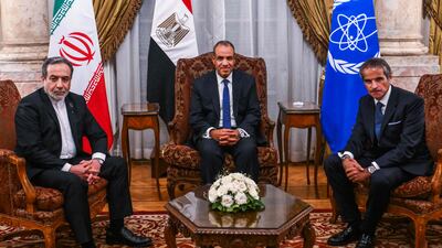 Egypt's Foreign Minister Badr Abdelatty, centre, with his Iranian counterpart Abbas Aragchi, left, and International Atomic Energy Agency chief Rafael Grossi, in Cairo on Tuesday. AFP