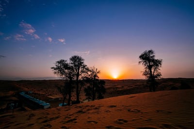 A view of the Alma Retreat at sunset