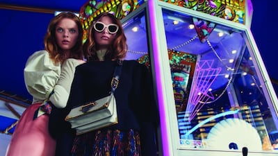 LOOK THE PART: On Sylwia, left, top, Dh6,000; cardigan (worn underneath), Dh6,500; skirt, Dh2,800, all from Christian Dior. On Barbara, right, sweater, Dh6,595; top, Dh2,595; skirt, Dh12,495, all from Burberry. Bag, Dh9,455, Prada. Sunglasses, about Dh1,350, Victoria Beckham. Photography: Samuli Karala at Things by People; Fashion director: Sarah Maisey, Stylist: Hafsa Lodi. Shot on location at The Funfair at THE BEACH, opposite JBR, Dubai.