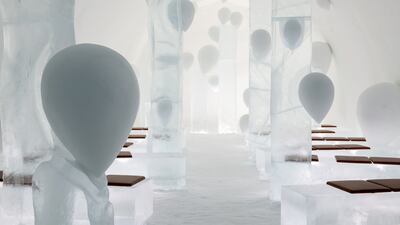 The Ceremony Hall with its snow-carved floating ballons at Icehotel 32.