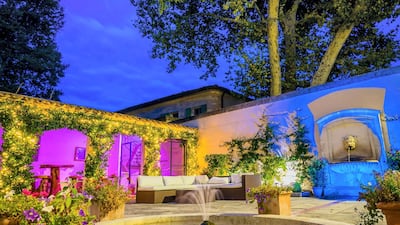 A courtyard at night. Courtesy Chateau De Tourreau