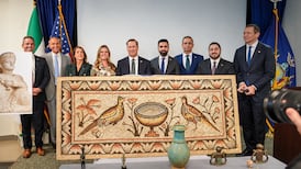 Syrian and American officials with a Roman mosaic that was returned by New York prosecutors Photo: Sana