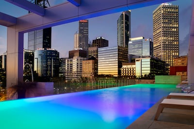 Catch a sunset poolside during your stay. Photo: Ritz-Carlton