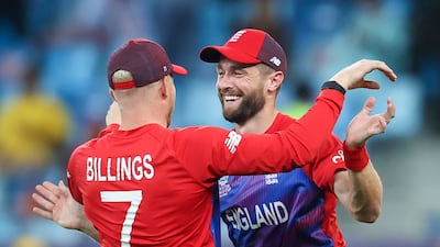 England's Chris Woakes celebrates the wicket of Steve Smith. EPA