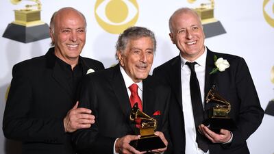 Danny Bennett,Tony Bennett and Dae Bennett, winners of Best Traditional Pop Vocal Album for 'Tony Bennett Celebrates 90,' pose in the press room. AFP