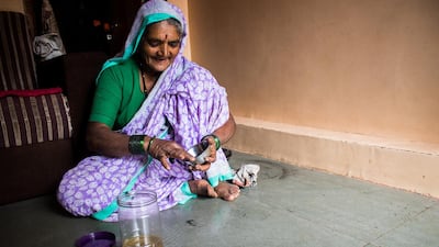 A few drops of either coconut or castor oil are added to the kohl.